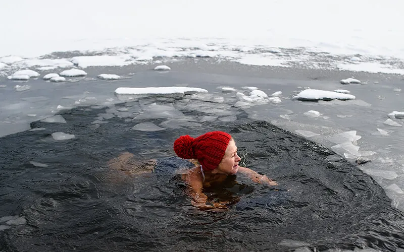 woman plunging in snow