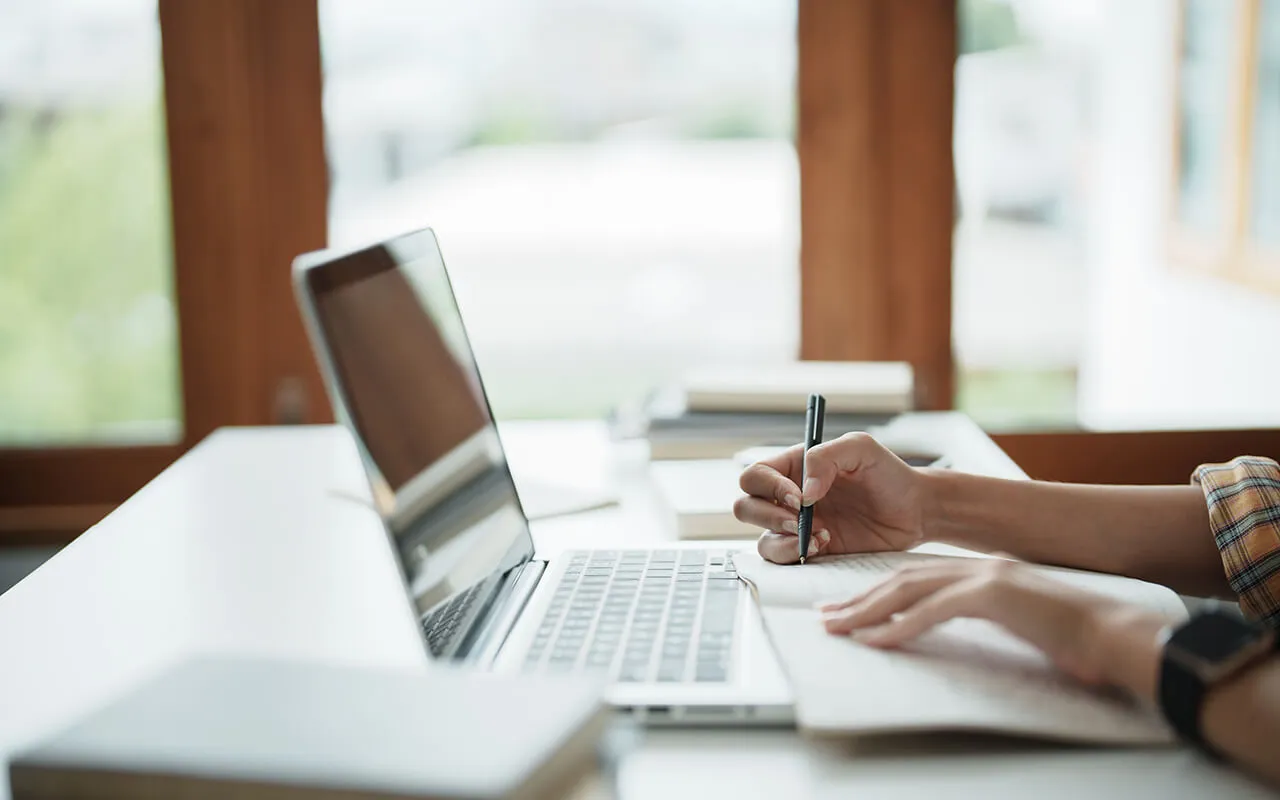 Working in a table with a laptop